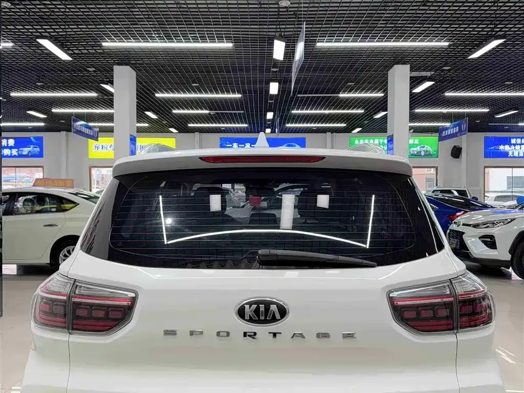 Kia Sportage — фото 8