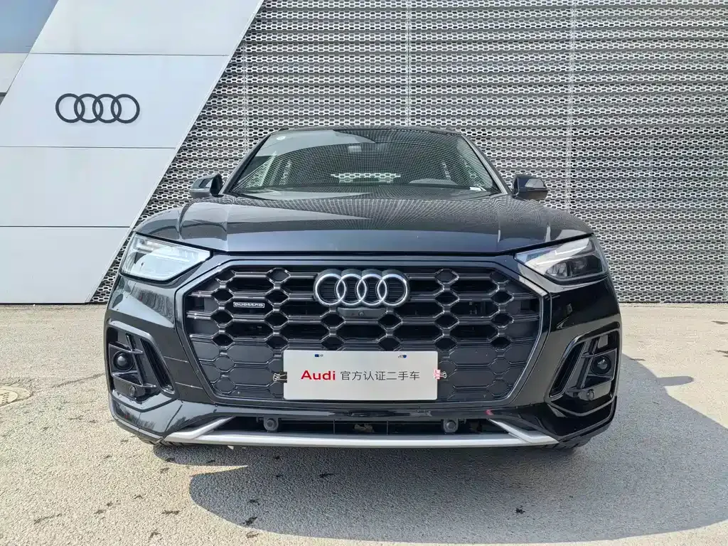 Audi Q5L — фото 9