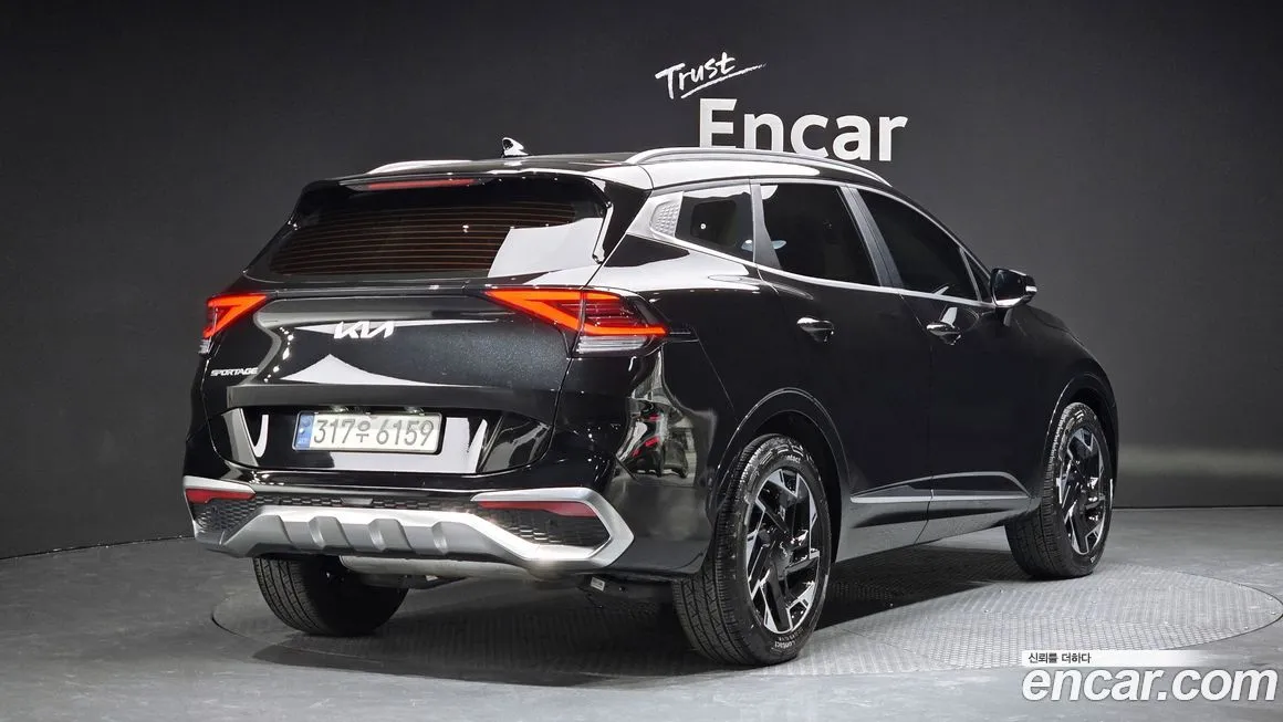 Kia Sportage — фото 10