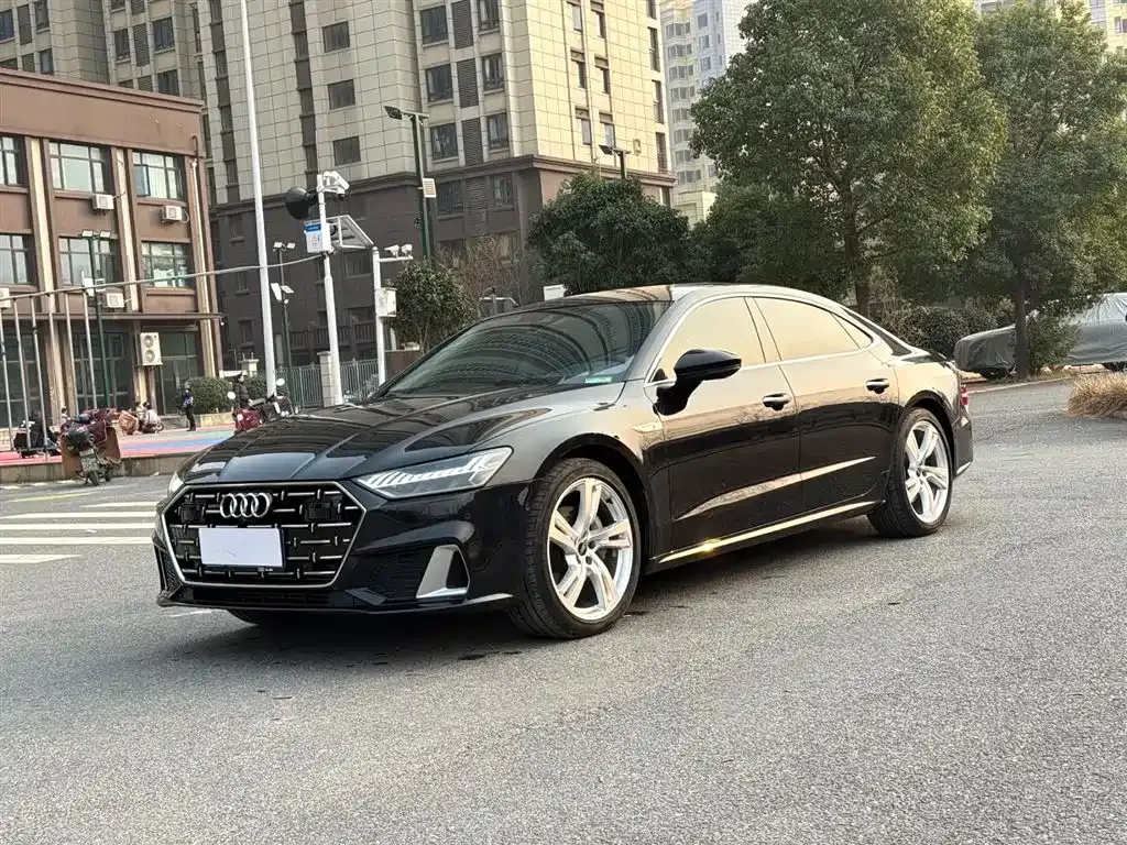 Audi A7L — фото 8
