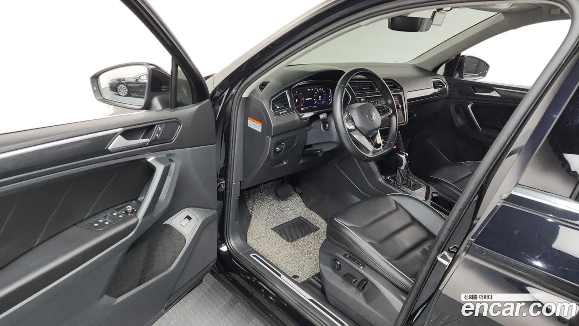 Volkswagen Tiguan — фото 10