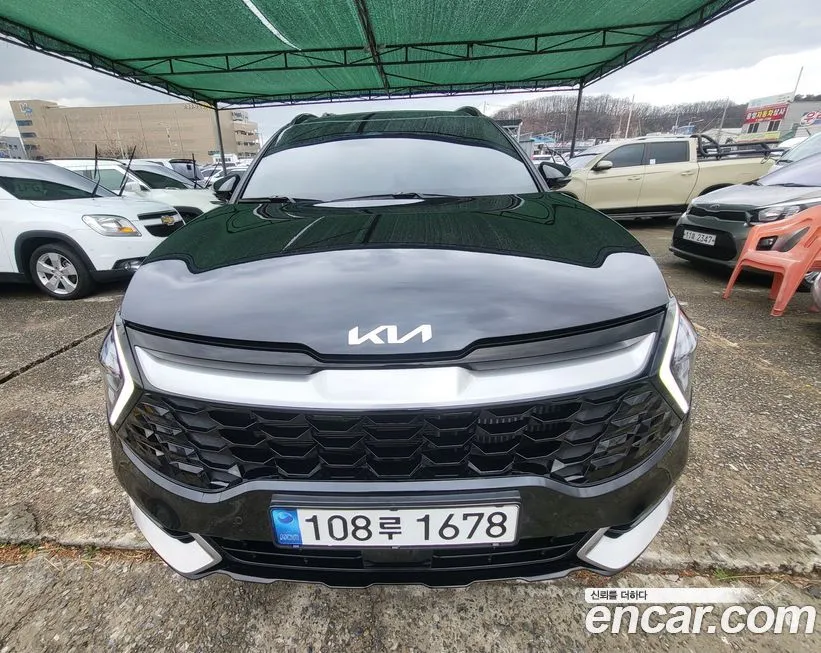 Kia Sportage — фото 1