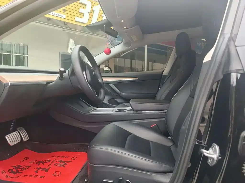 Tesla Model 3 — фото 2