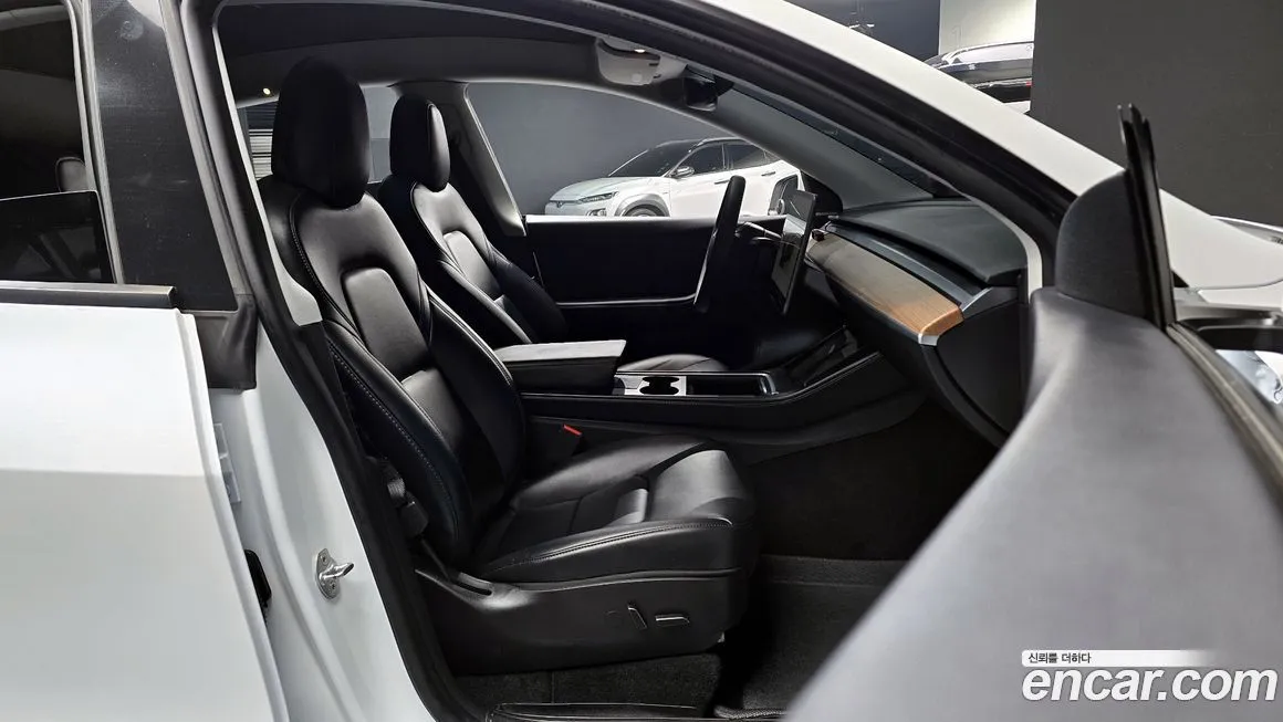 Tesla Model Y — фото 6