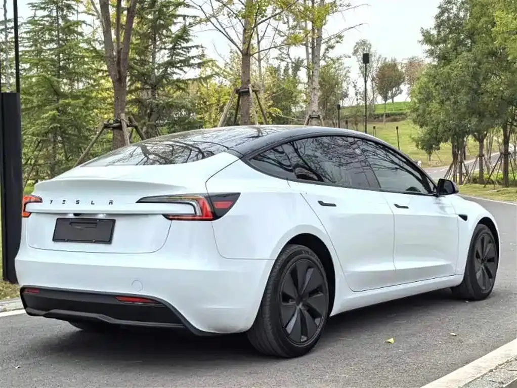 Tesla Model 3 — фото 7