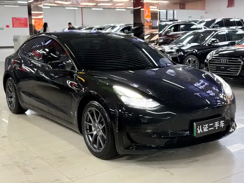 Tesla Model 3 — фото 8