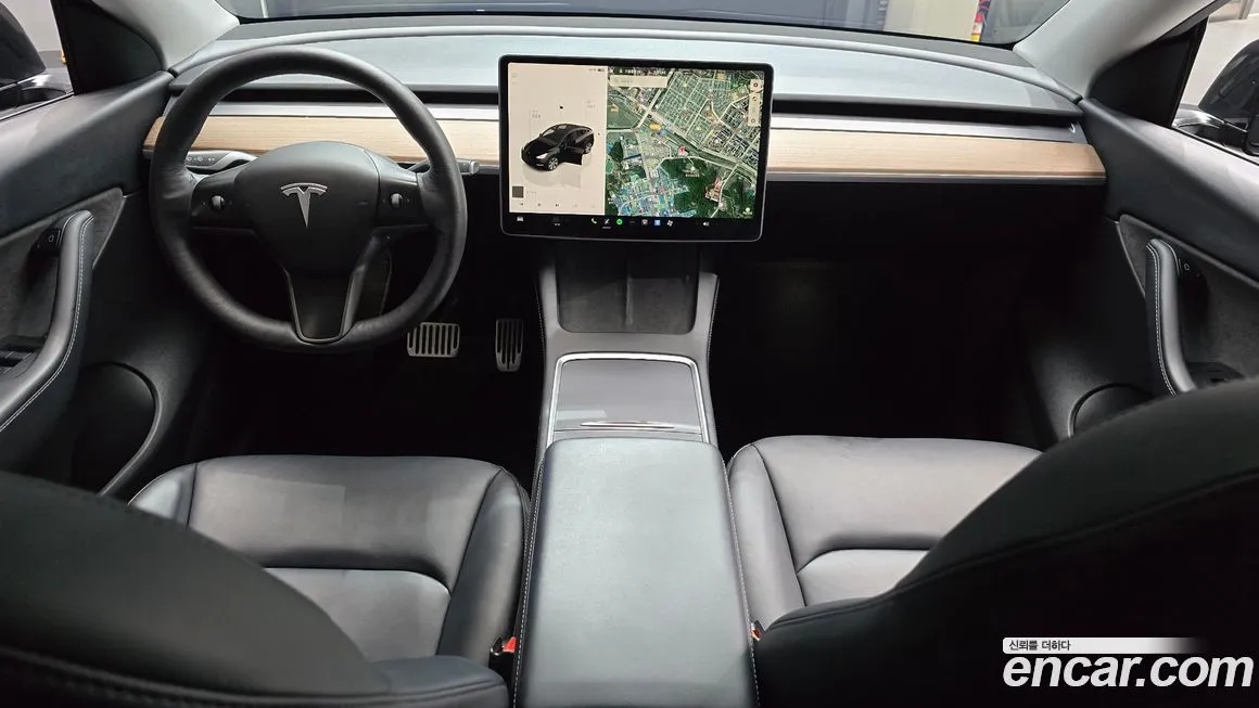 Tesla Model Y — фото 10