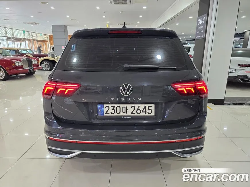 Volkswagen Tiguan — фото 10