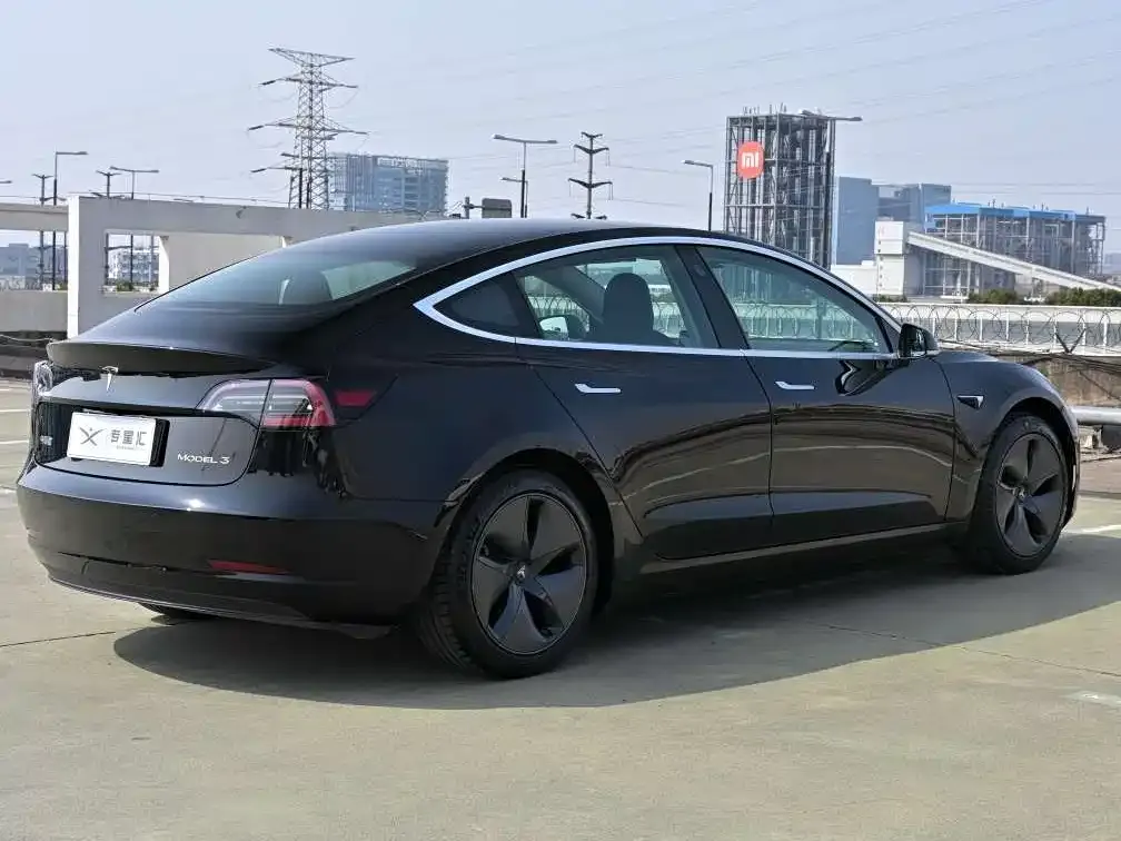 Tesla Model 3 — фото 7