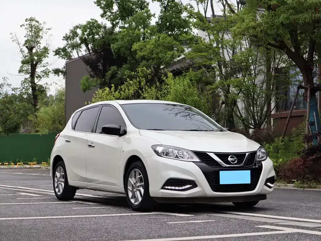 Nissan Tiida — фото 9