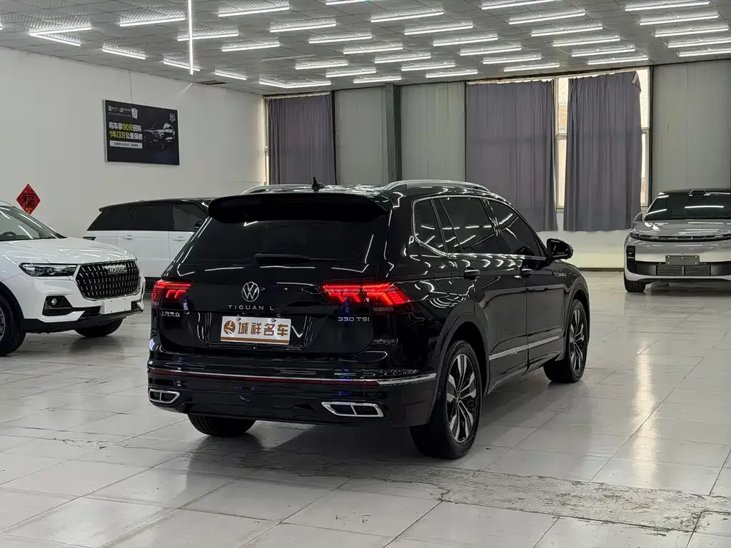Volkswagen Tiguan L — фото 4