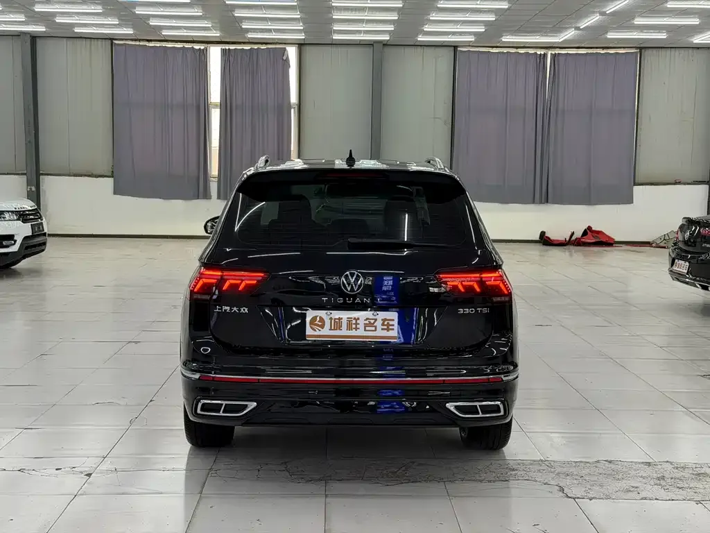 Volkswagen Tiguan L — фото 3