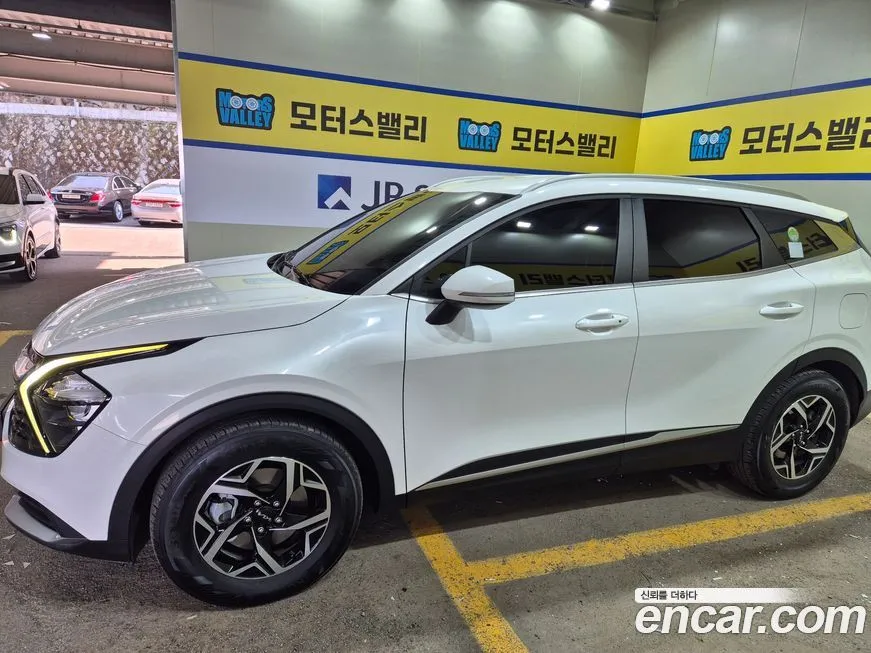 Kia Sportage — фото 8