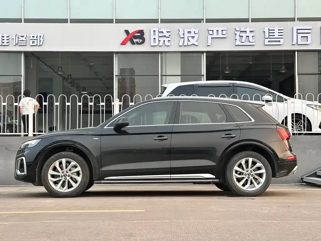 Audi Q5L — фото 10