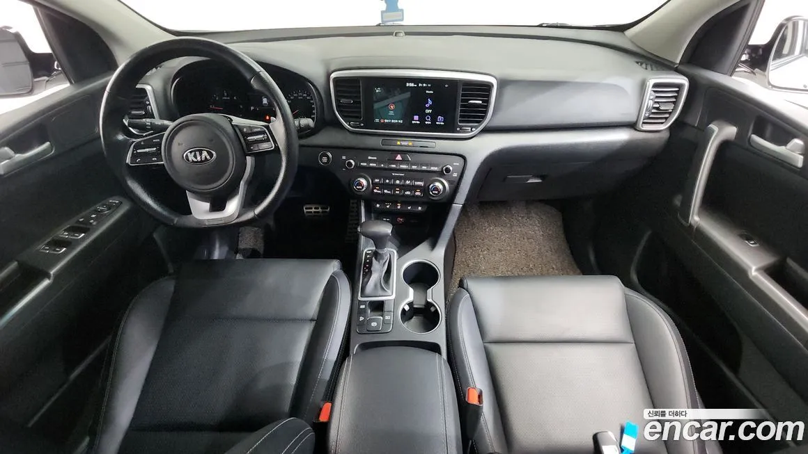 Kia Sportage — фото 10