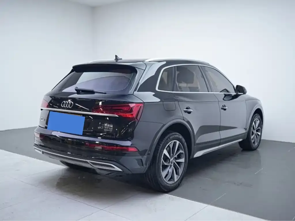 Audi Q5L — фото 6