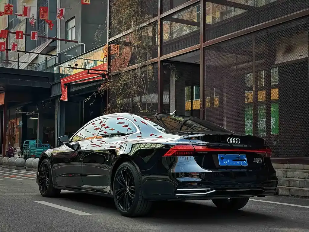 Audi A7L — фото 7