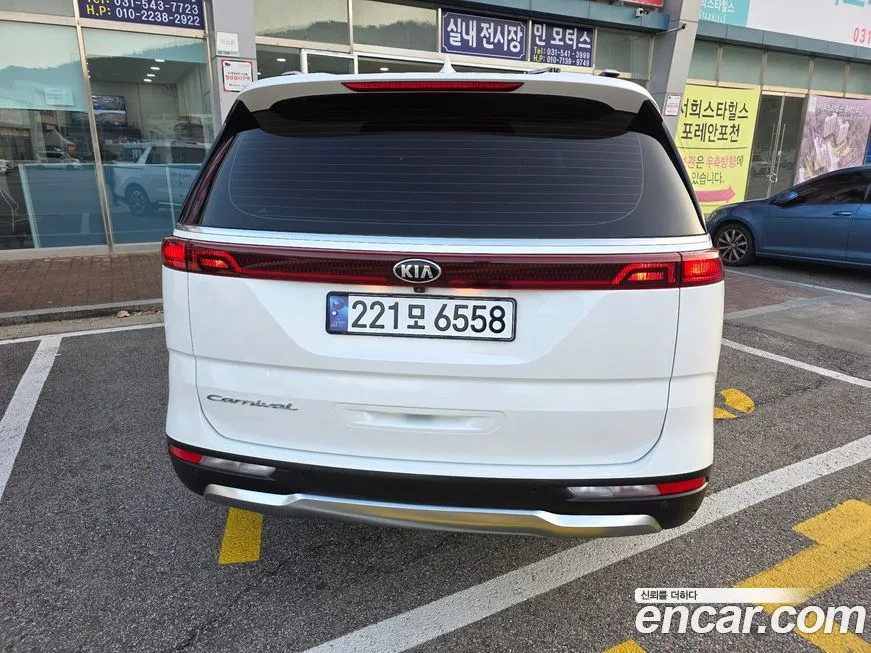 Kia Carnival — фото 10
