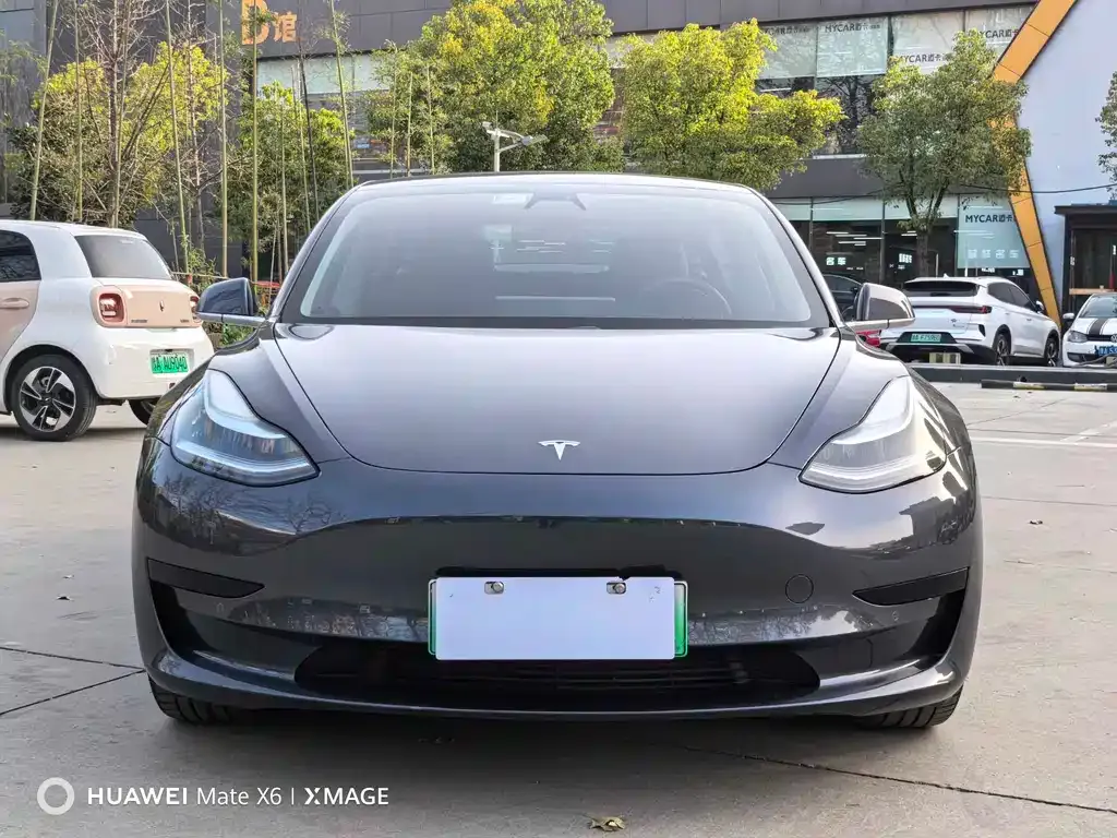 Tesla Model 3 — фото 7