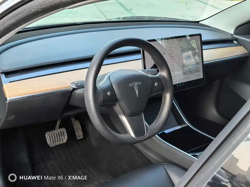 Tesla Model 3 — фото 5