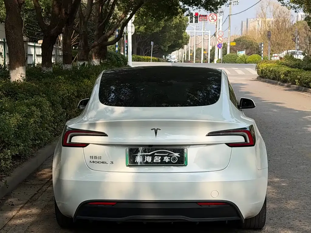 Tesla Model 3 — фото 5