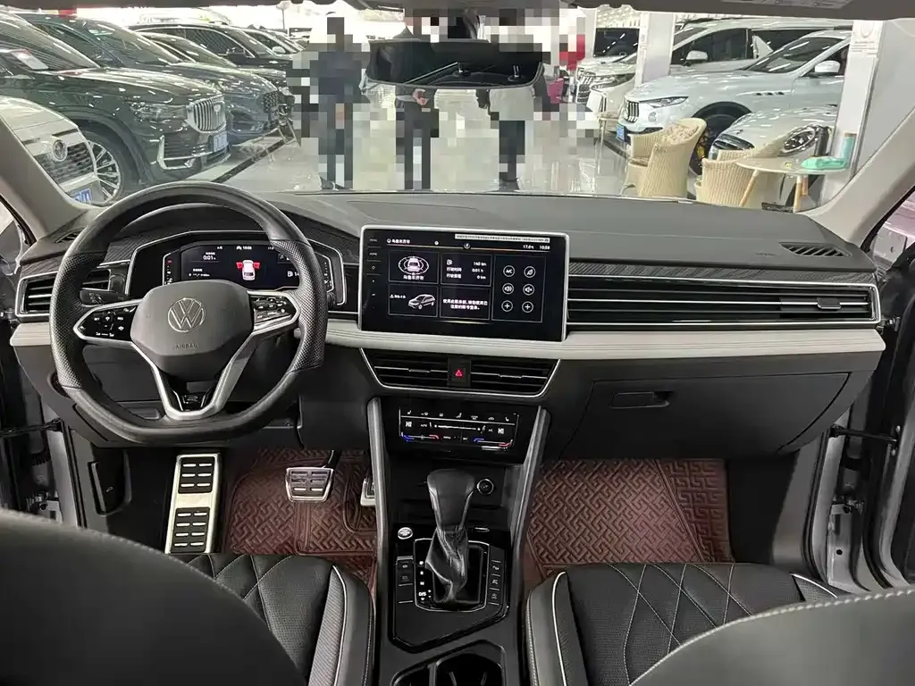 Volkswagen Tiguan L — фото 7