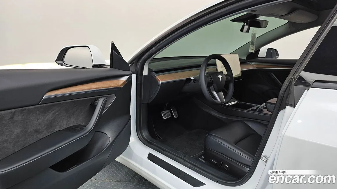 Tesla Model 3 — фото 9
