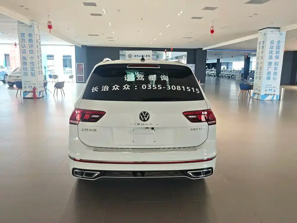 Volkswagen Tiguan L — фото 10