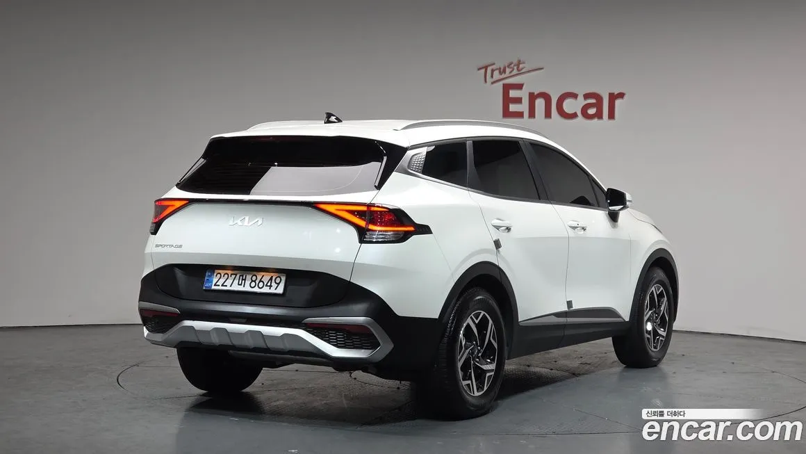 Kia Sportage — фото 8