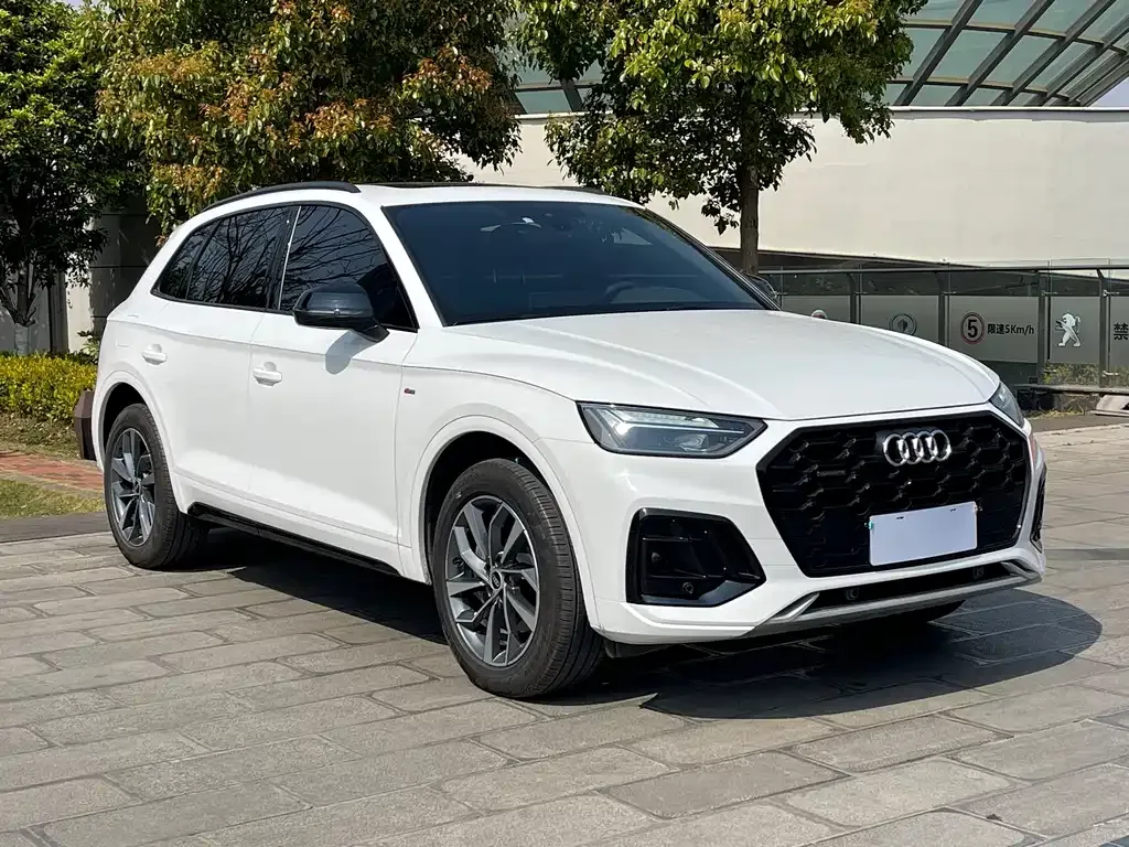 Audi Q5L — фото 5