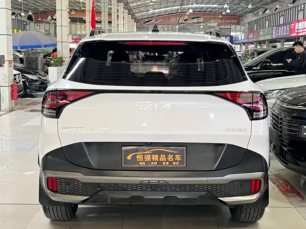 Kia Sportage — фото 10