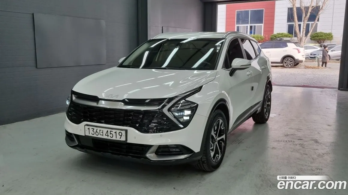 Kia Sportage — фото 1
