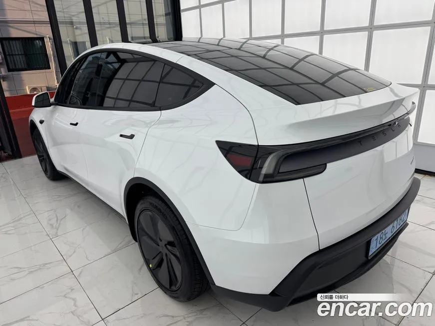 Tesla Model Y — фото 7