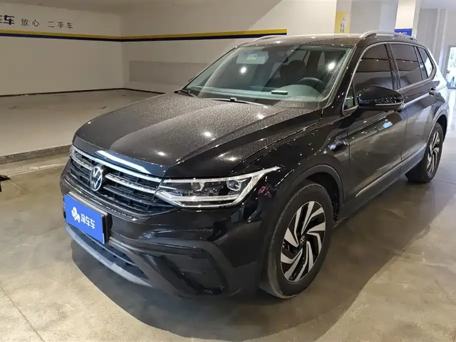 Volkswagen Tiguan L — фото 1