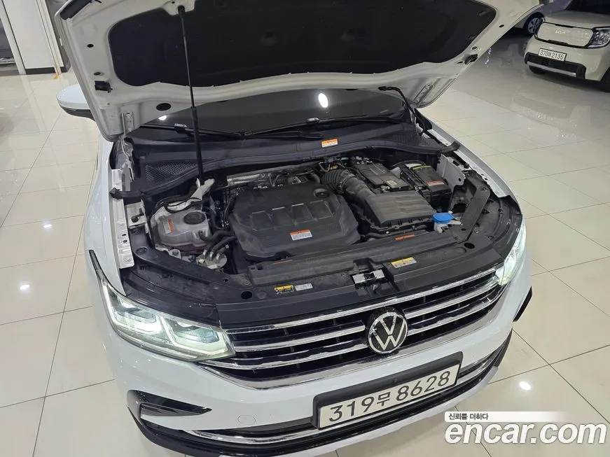 Volkswagen Tiguan — фото 9