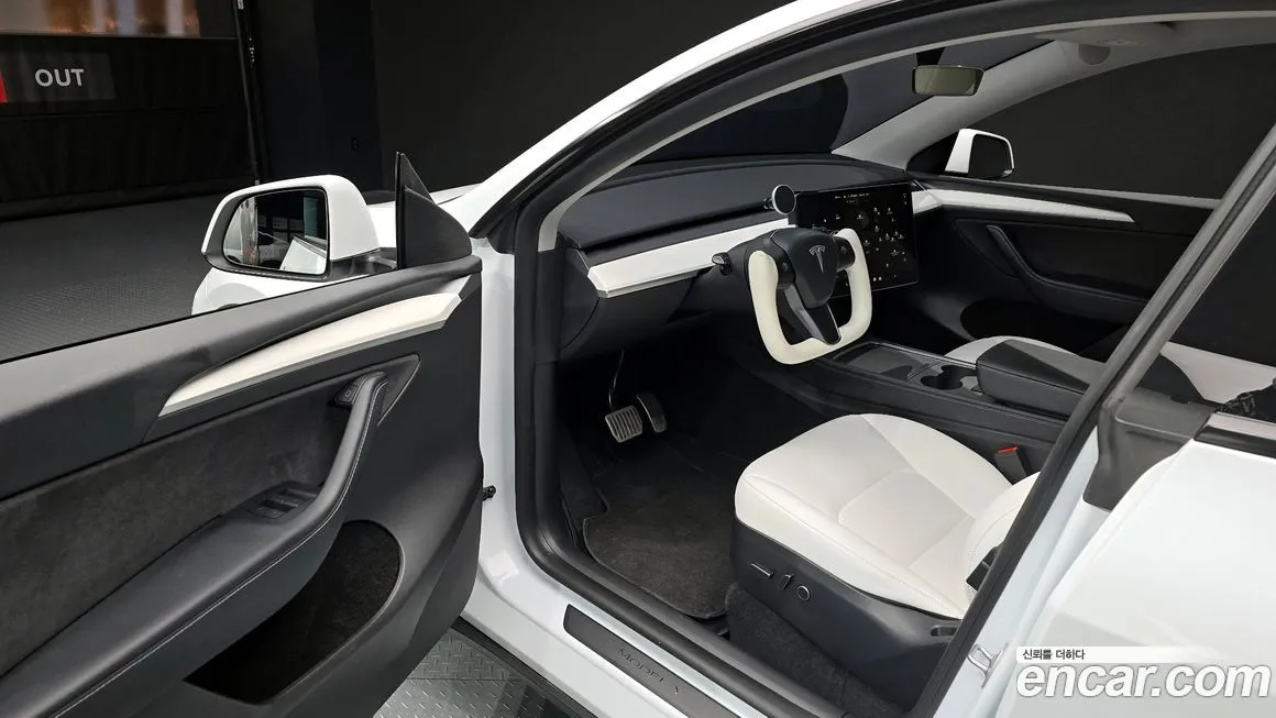 Tesla Model Y — фото 8