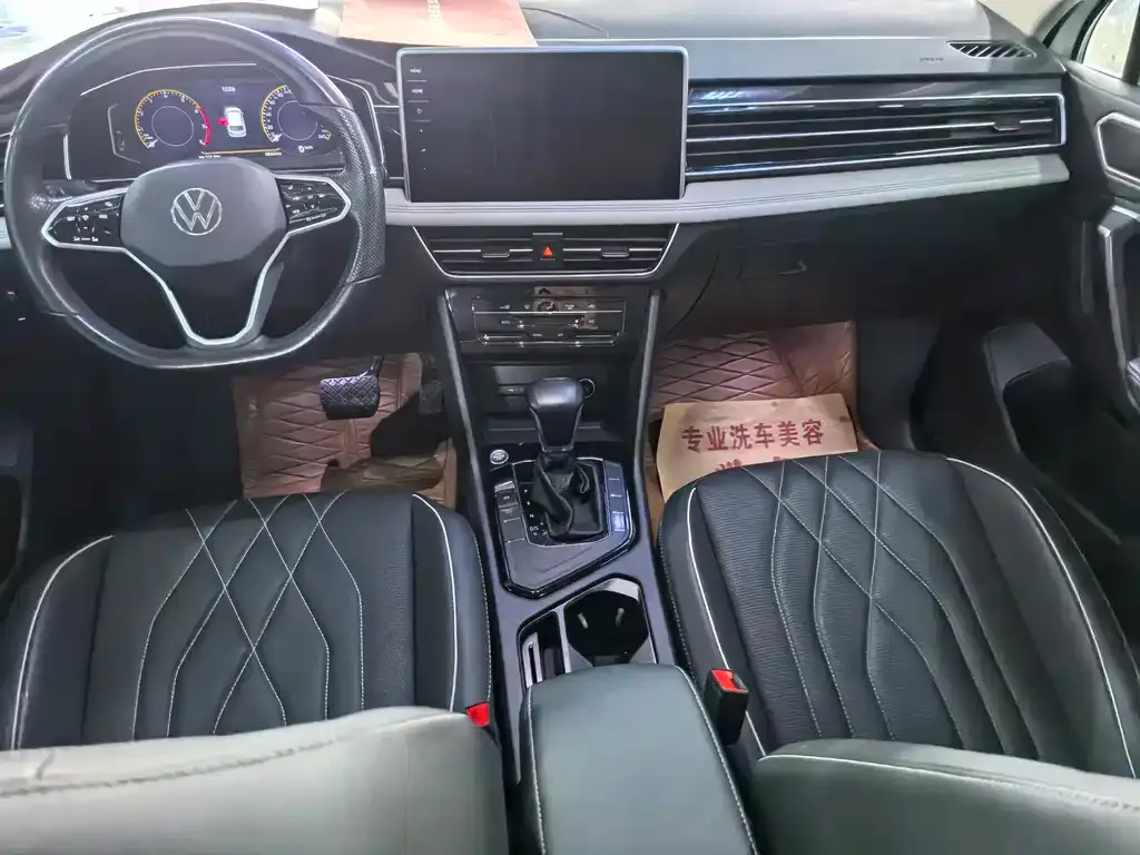 Volkswagen Tiguan L — фото 10