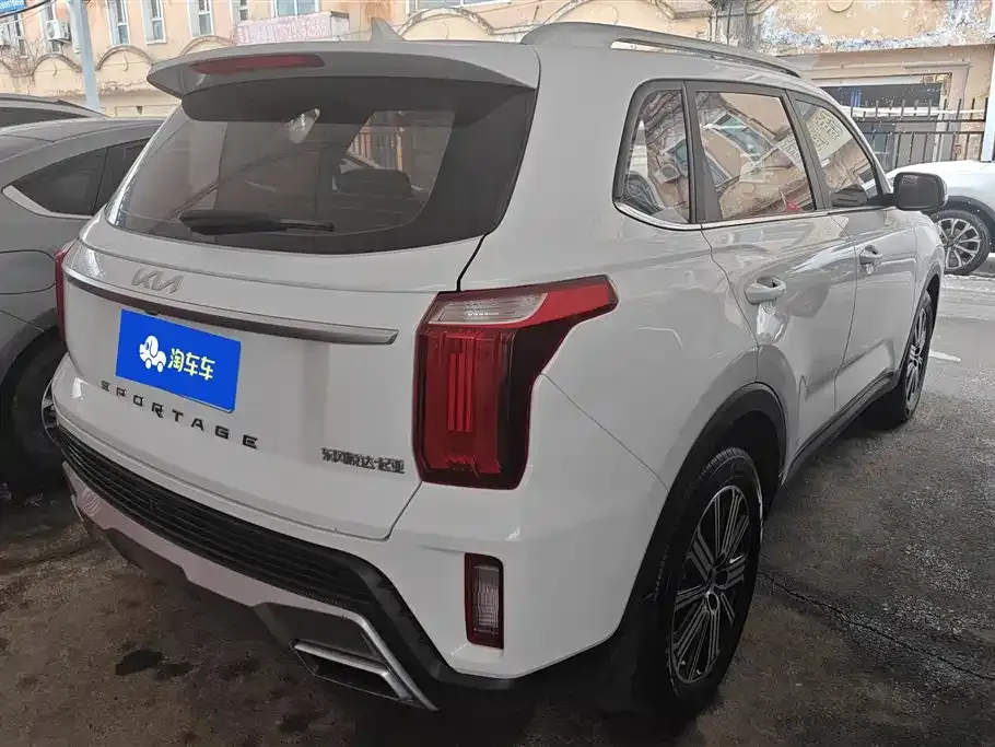 Kia Sportage — фото 10