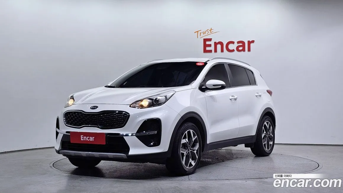 Kia Sportage — фото 1
