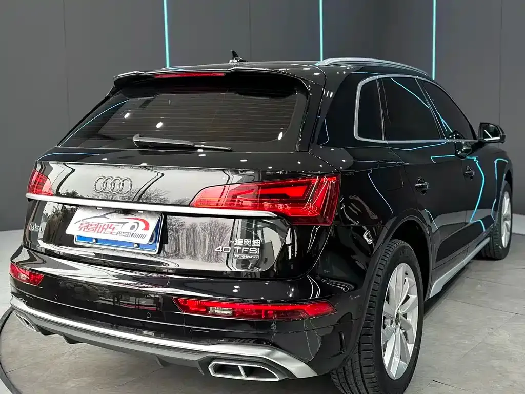 Audi Q5L — фото 5