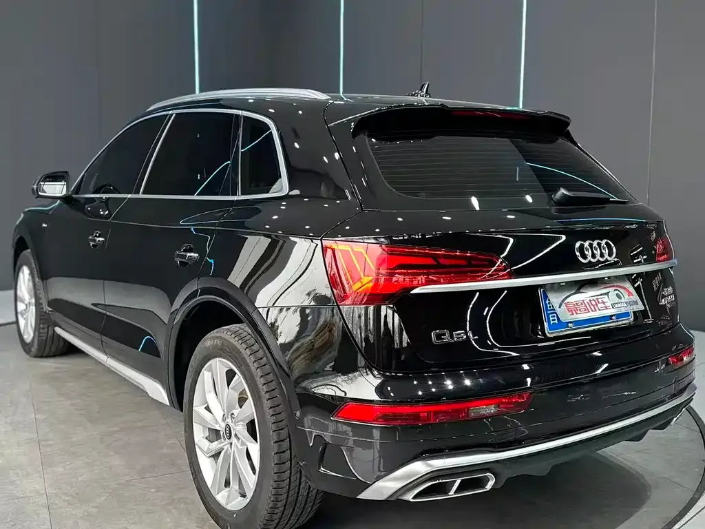 Audi Q5L — фото 6