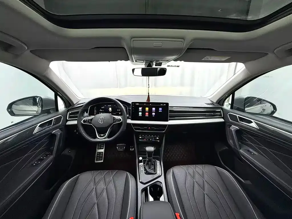 Volkswagen Tiguan L — фото 7