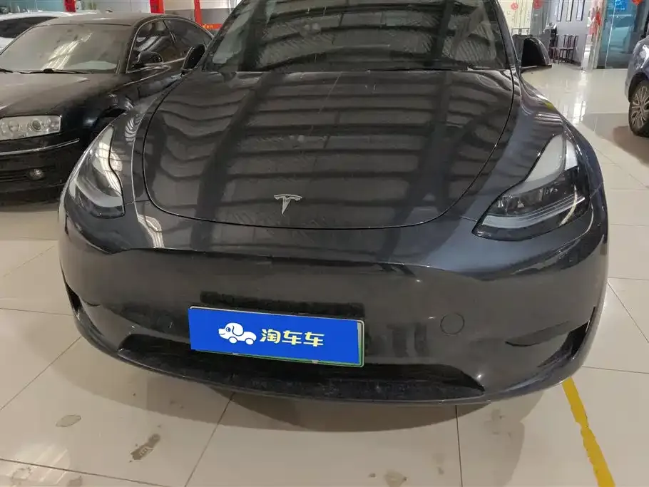 Tesla Model Y — фото 8