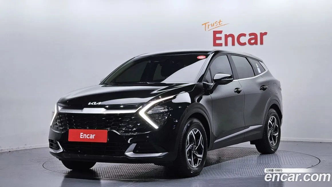 Kia Sportage — фото 1