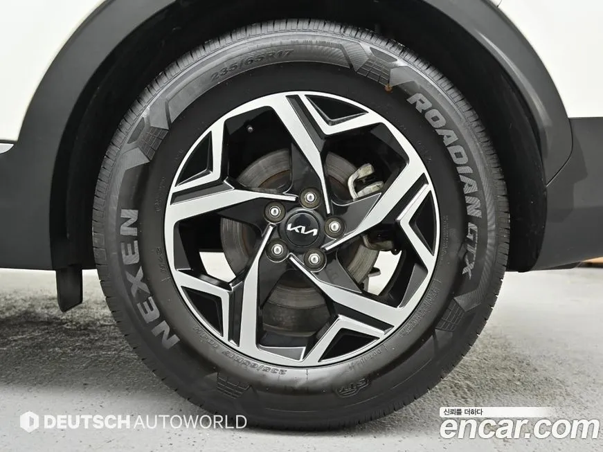 Kia Sportage — фото 9