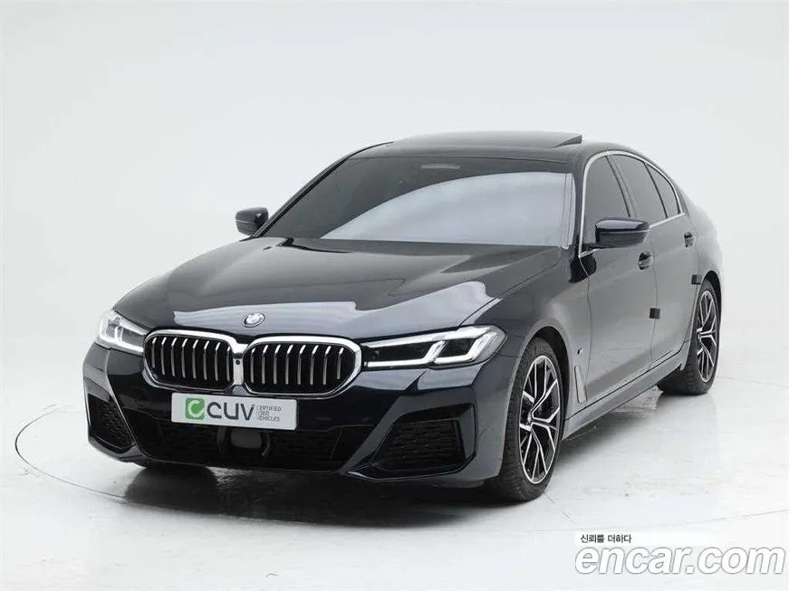 BMW 5-Series — фото 1