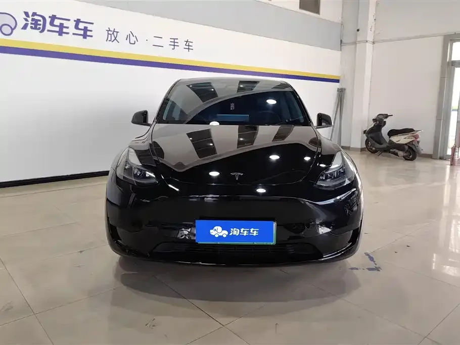 Tesla Model Y — фото 10