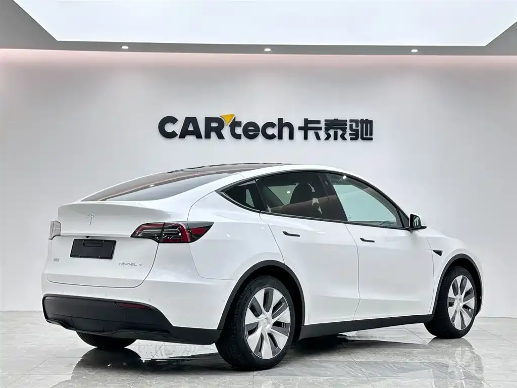 Tesla Model Y — фото 7