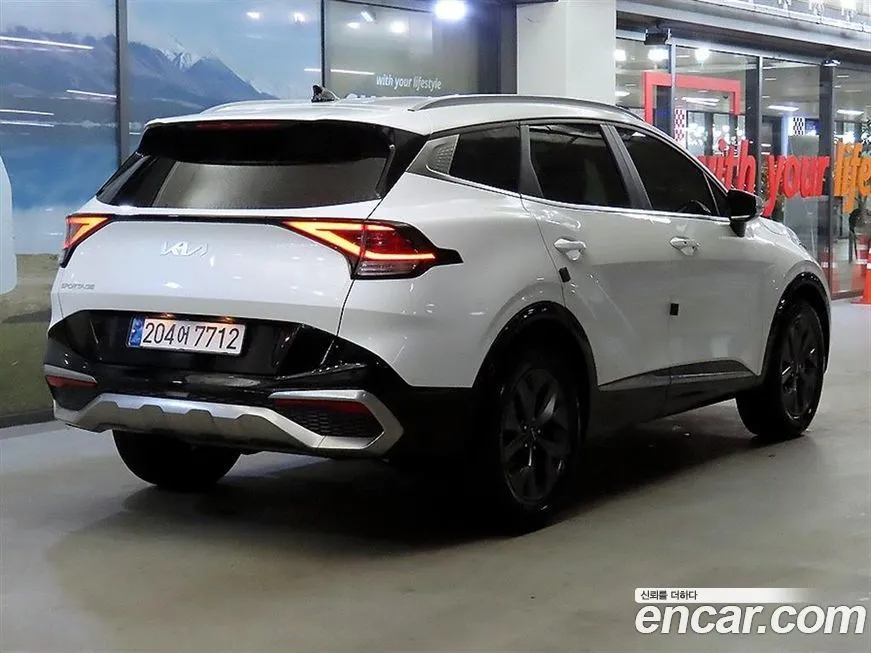 Kia Sportage — фото 10