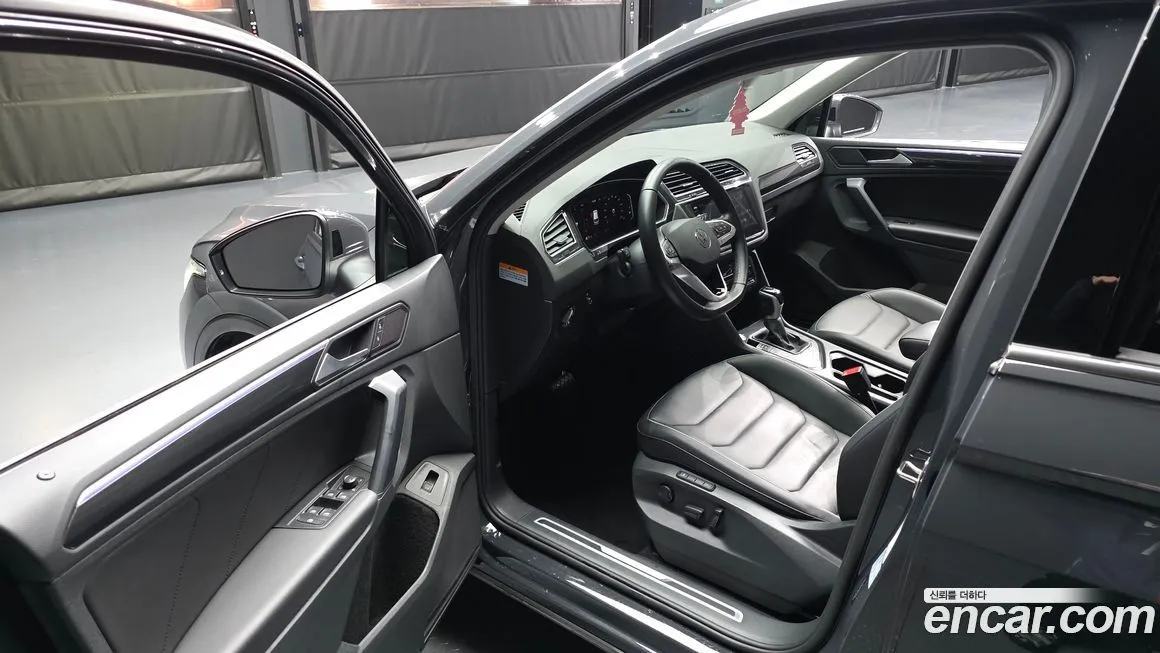 Volkswagen Tiguan — фото 10